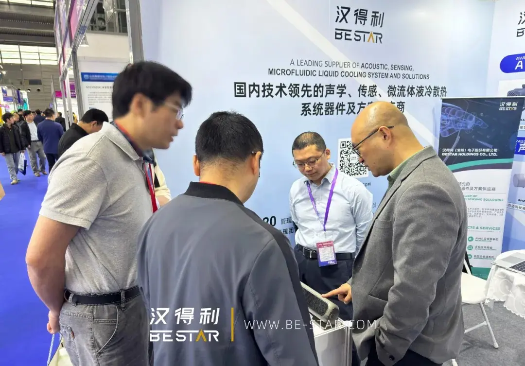 Demonstrating directional Bluetooth audio at the booth.jpg